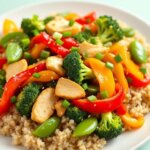 Healthy chicken stir fry made with tender chicken breast and colorful vegetables served over brown rice